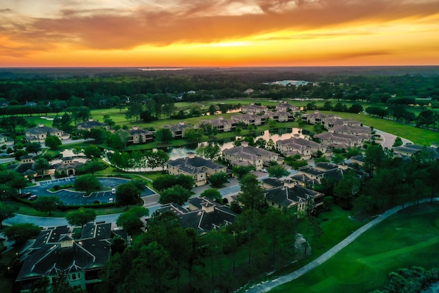 aerial view featuring a water view and a residential view