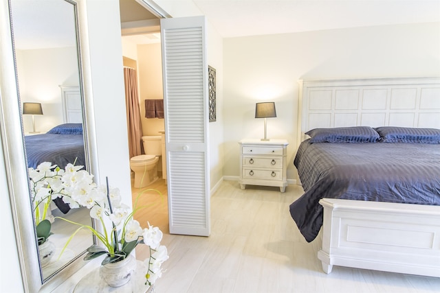 890 A1A Beach Blvd Unit 74, Saint Augustine Beach, FL 32080 - bedroom featuring baseboards and ensuite bath