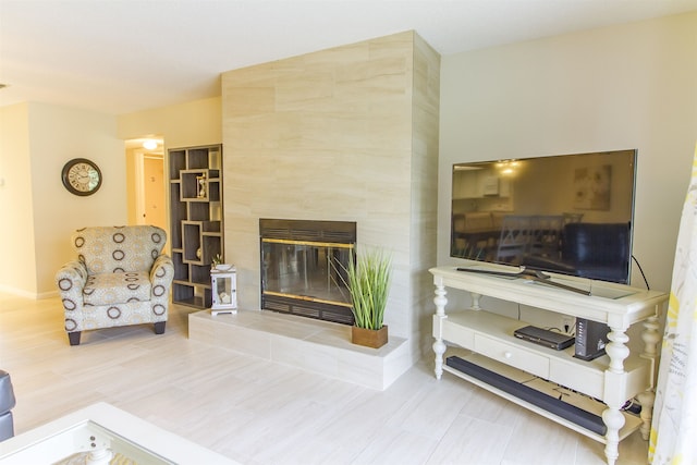 890 A1A Beach Blvd Unit 74, Saint Augustine Beach, FL 32080 - living area with baseboards and a fireplace