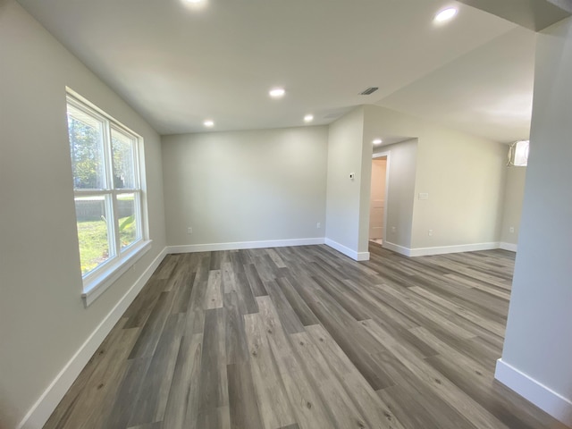 spare room featuring hardwood / wood-style floors