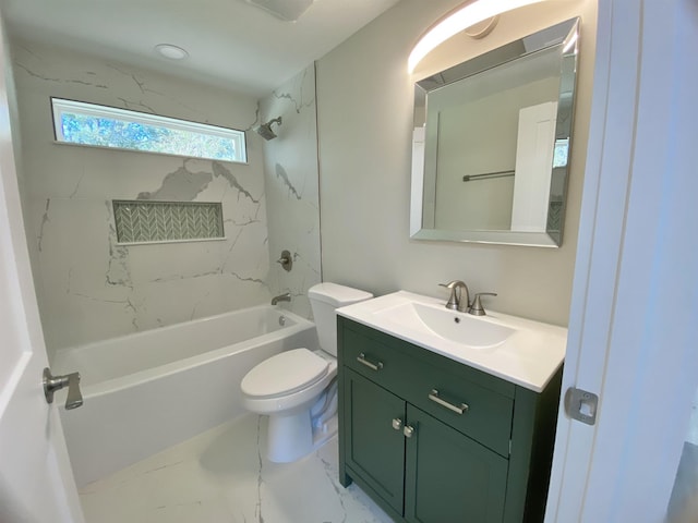 full bathroom featuring vanity, toilet, and tiled shower / bath combo