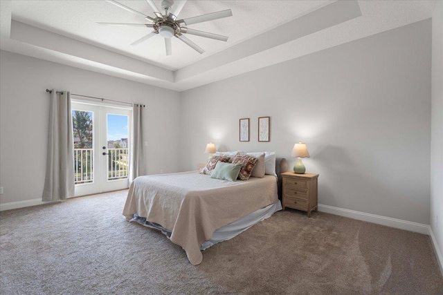 295 Ferndale Way, Saint Augustine, FL 32092 - carpeted bedroom with access to outside, a tray ceiling, baseboards, and a ceiling fan