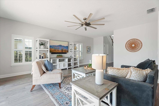 295 Ferndale Way, Saint Augustine, FL 32092 - living area with wood finished floors, ceiling fan, and baseboards