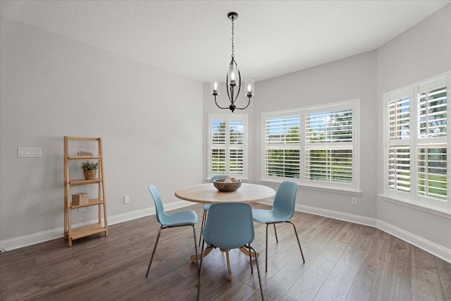 295 Ferndale Way, Saint Augustine, FL 32092 - dining space with a chandelier, wood finished floors, healthy amount of natural light, and baseboards