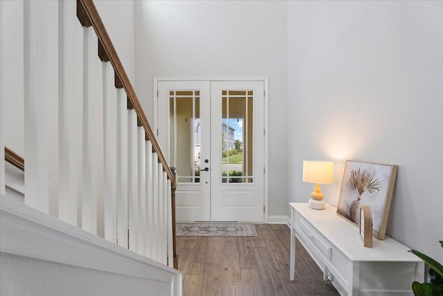 295 Ferndale Way, Saint Augustine, FL 32092 - foyer entrance with wood finished floors, stairway, and baseboards