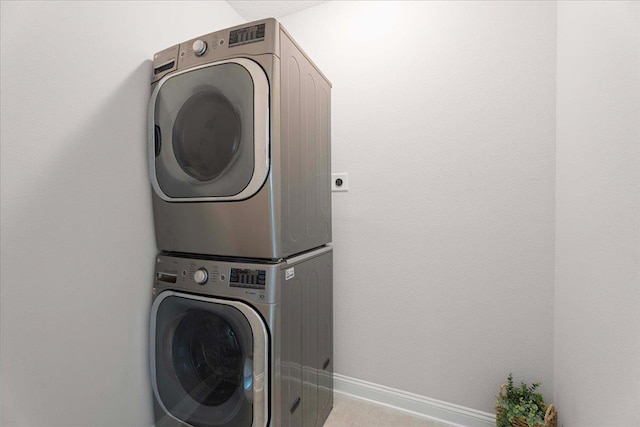295 Ferndale Way, Saint Augustine, FL 32092 - laundry area with stacked washer and clothes dryer and baseboards