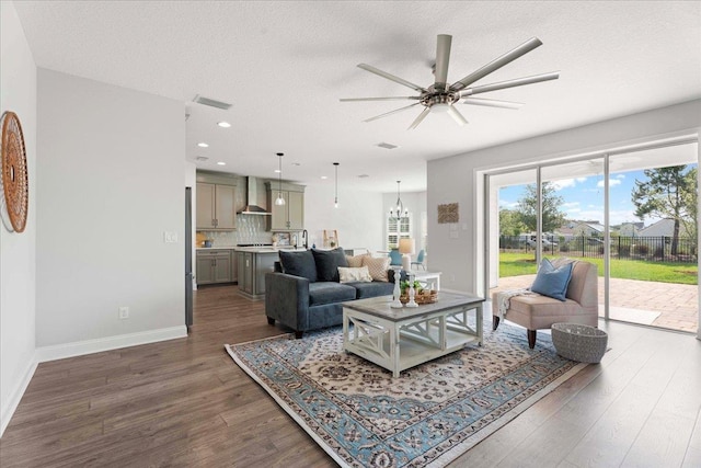 295 Ferndale Way, Saint Augustine, FL 32092 - living room with dark wood-type flooring, a ceiling fan, baseboards, recessed lighting, and a textured ceiling