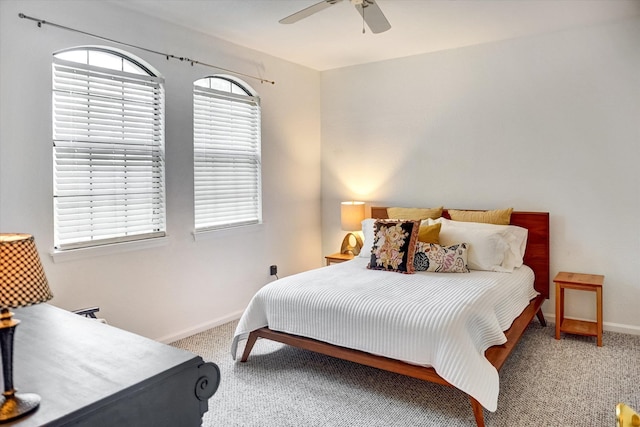 bedroom featuring ceiling fan and carpet floors