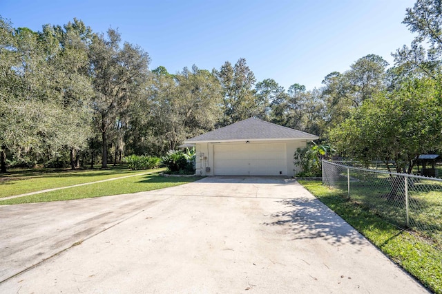 view of side of home with a lawn