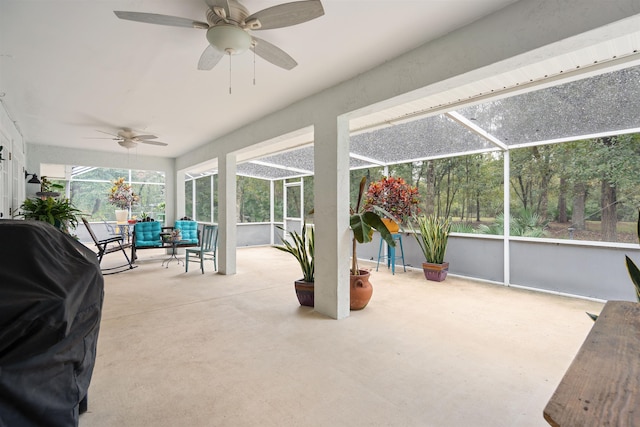 sunroom / solarium with ceiling fan