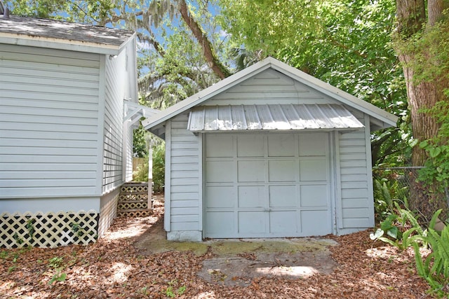 garage featuring fence