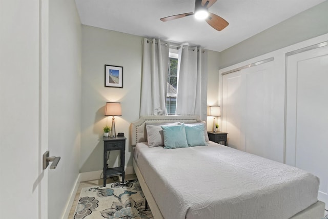 bedroom featuring baseboards and a ceiling fan