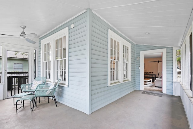 view of patio with a porch and ceiling fan