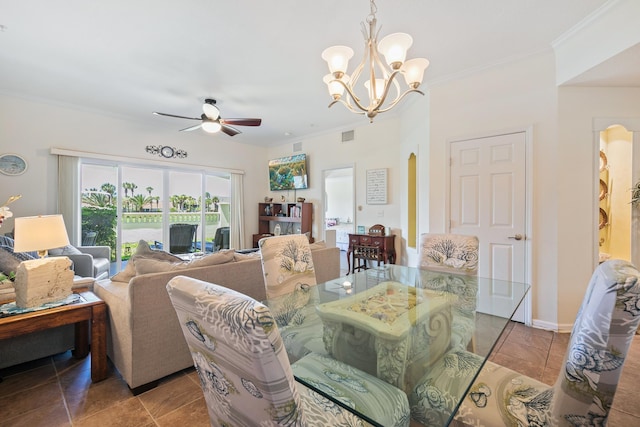 dining space with ceiling fan with notable chandelier and ornamental molding