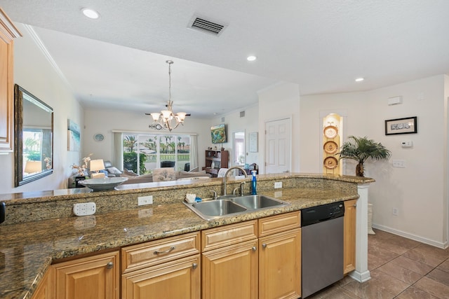 kitchen with crown molding, sink, dark stone countertops, dishwasher, and a chandelier