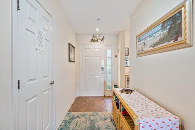 entrance foyer with light tile patterned flooring