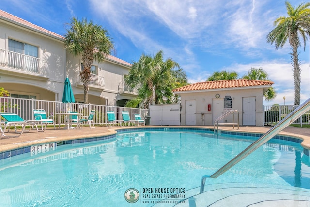 view of pool featuring a patio