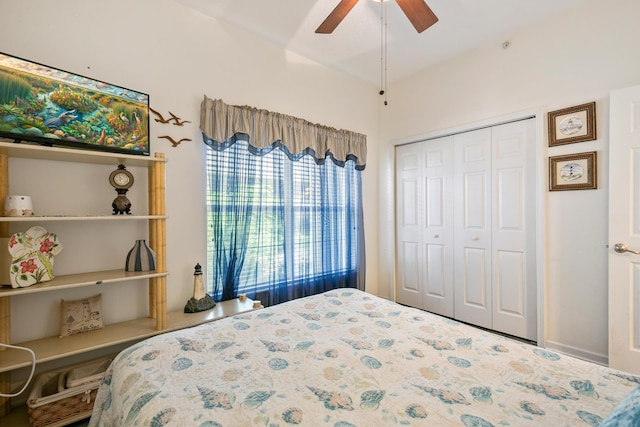 bedroom with ceiling fan and a closet