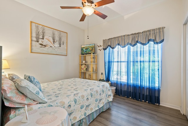 bedroom featuring ceiling fan and hardwood / wood-style floors