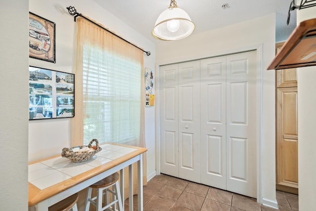 entrance foyer featuring light tile patterned floors