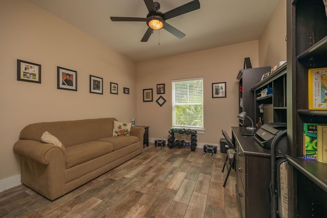 interior space with ceiling fan and hardwood / wood-style flooring