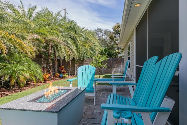 view of patio featuring a fire pit