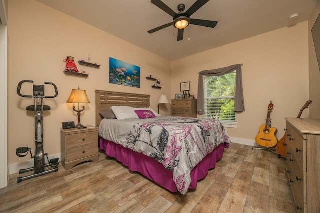 bedroom featuring ceiling fan and hardwood / wood-style floors