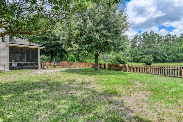 104 Claremont Ct, Elkton, FL 32033 - fenced backyard featuring a sunroom