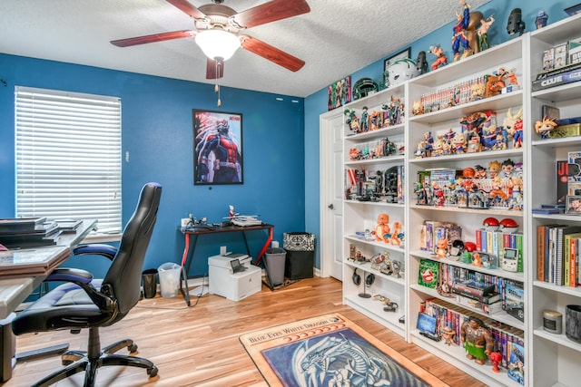 104 Claremont Ct, Elkton, FL 32033 - office area featuring a ceiling fan, a textured ceiling, and wood finished floors