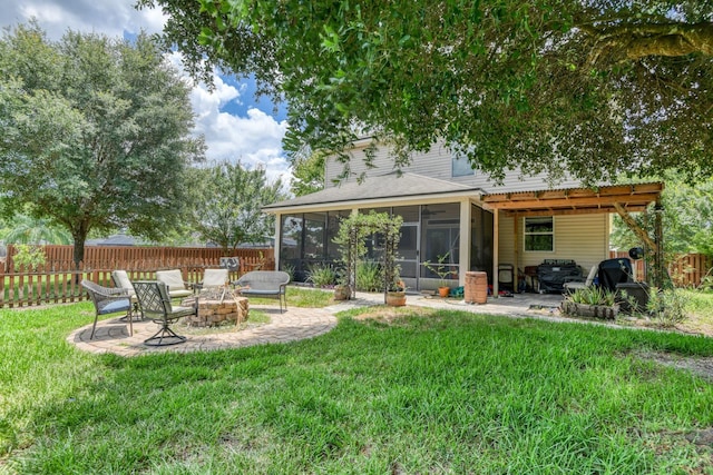 104 Claremont Ct, Elkton, FL 32033 - fenced backyard featuring a sunroom, a patio, and a fire pit