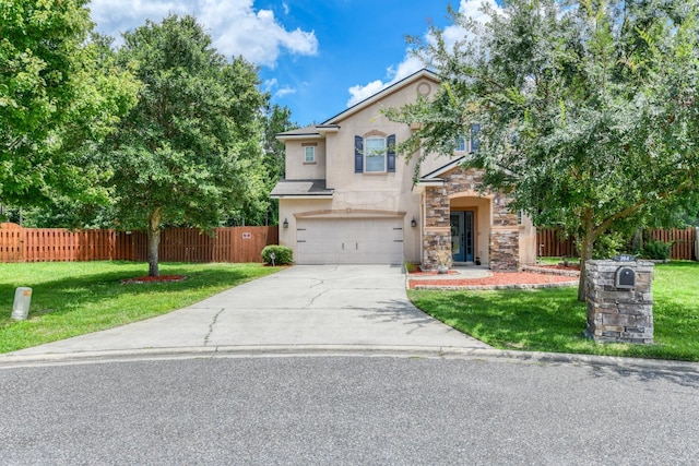 104 Claremont Ct, Elkton, FL 32033 - traditional-style home with stucco siding, driveway, stone siding, and a garage