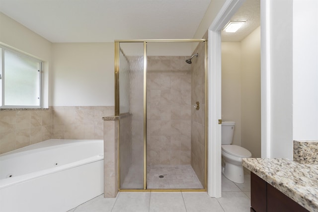 full bathroom with shower with separate bathtub, vanity, toilet, and tile patterned floors