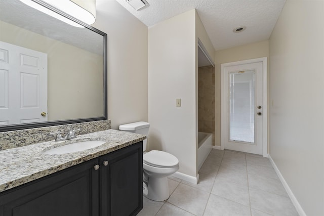 full bathroom with vanity, tile patterned floors, toilet, a textured ceiling, and tub / shower combination