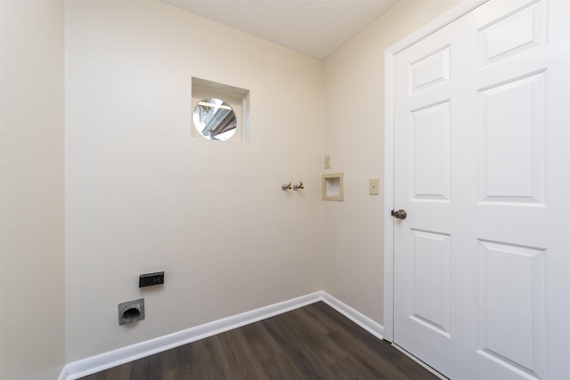 washroom featuring dark hardwood / wood-style flooring and a textured ceiling