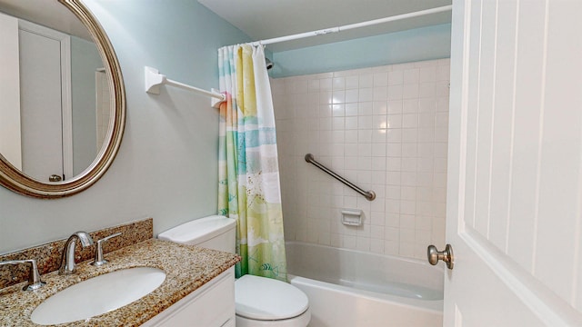 full bathroom featuring shower / bath combination with curtain, vanity, and toilet