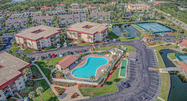 birds eye view of property featuring a water view