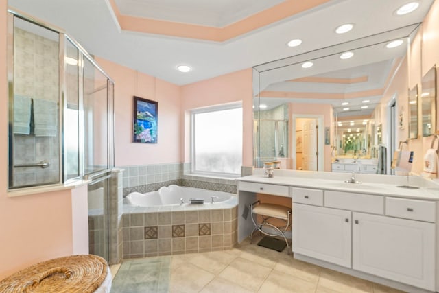 bathroom featuring crown molding, tile patterned flooring, vanity, a raised ceiling, and independent shower and bath