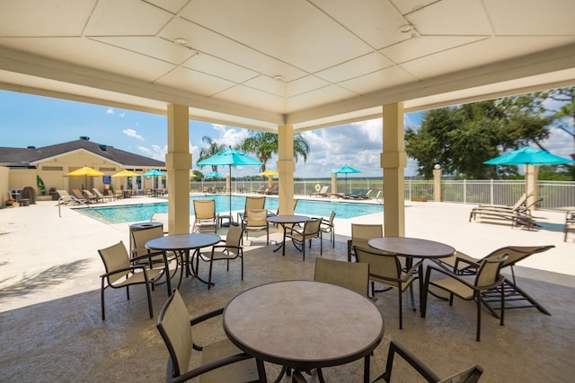 view of patio with a community pool