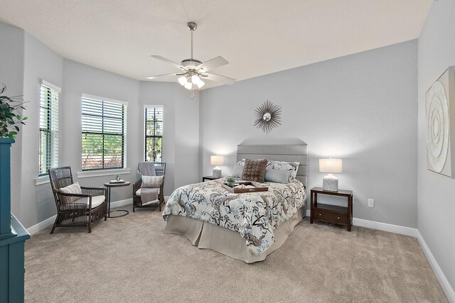 175 Laterra Links Cir Unit 101, Saint Augustine, FL 32092 - carpeted bedroom with baseboards and ceiling fan