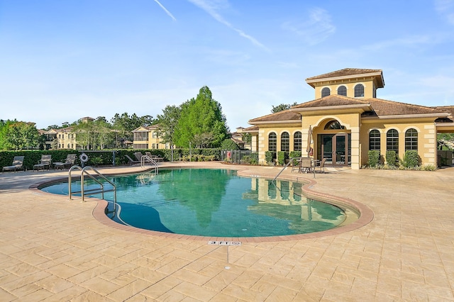 175 Laterra Links Cir Unit 101, Saint Augustine, FL 32092 - community pool with a patio area, french doors, and fence