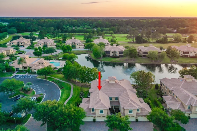 175 Laterra Links Cir Unit 101, Saint Augustine, FL 32092 - aerial view at dusk featuring a water view and a residential view