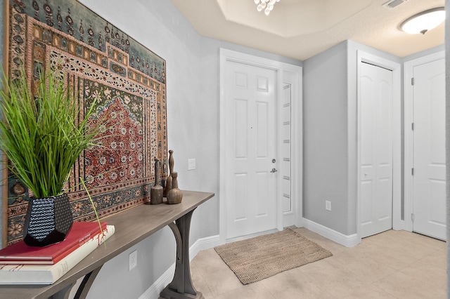 175 Laterra Links Cir Unit 101, Saint Augustine, FL 32092 - entrance foyer with baseboards and visible vents