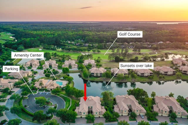 175 Laterra Links Cir Unit 101, Saint Augustine, FL 32092 - aerial view at dusk featuring a water view and a residential view