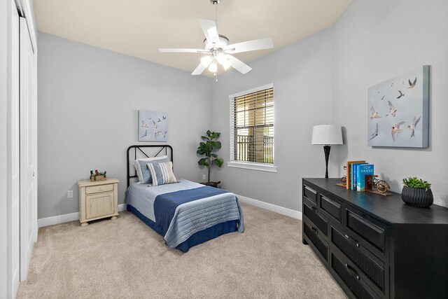 175 Laterra Links Cir Unit 101, Saint Augustine, FL 32092 - bedroom with light colored carpet, baseboards, and ceiling fan