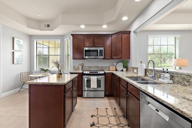 175 Laterra Links Cir Unit 101, Saint Augustine, FL 32092 - kitchen featuring a sink, stainless steel appliances, a healthy amount of sunlight, visible vents, and recessed lighting