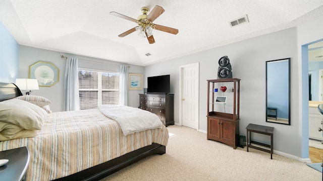 bedroom featuring visible vents, light carpet, baseboards, and a ceiling fan