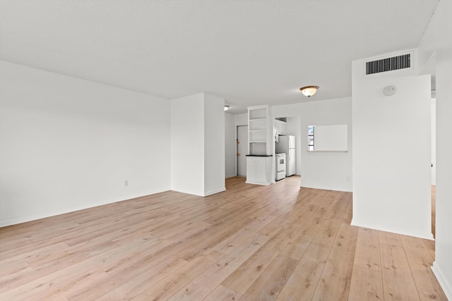 600 Domenico Cir Unit G9, Saint Augustine, FL 32086 - unfurnished living room with light wood-type flooring