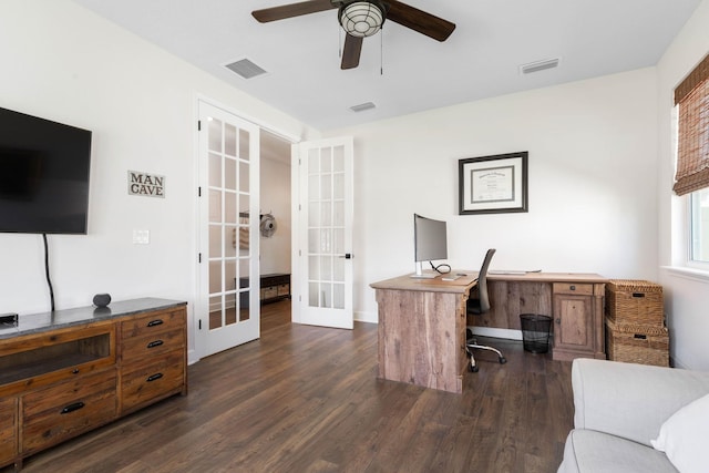 office featuring dark wood-type flooring, french doors, visible vents, and ceiling fan