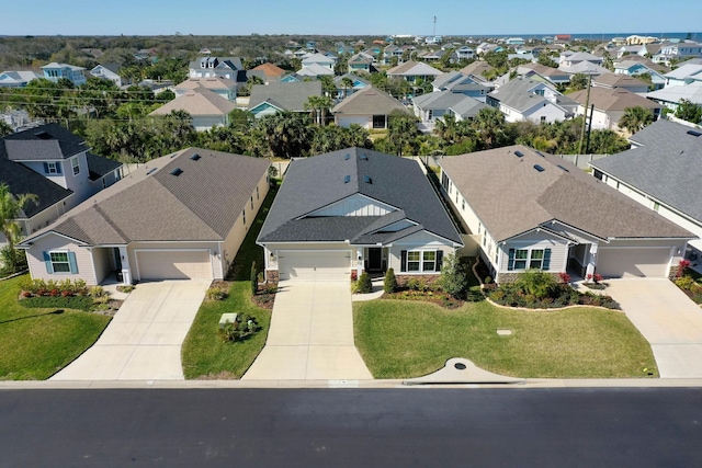 drone / aerial view with a residential view