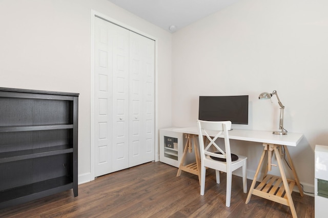 office with baseboards and dark wood-type flooring